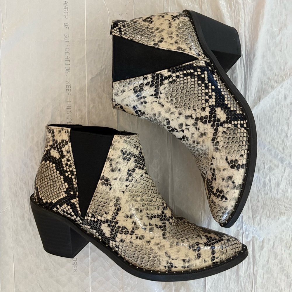 Snakeskin heeled boots